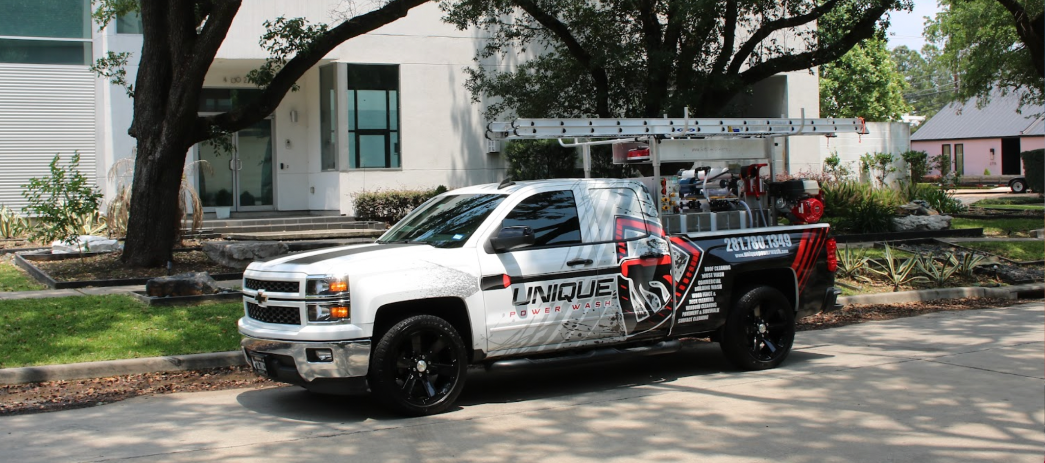 Unique Power Wash truck carrying a professional soft-wash equipment system